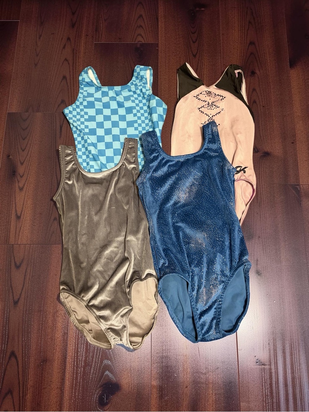 4 Leo’s Girls Blue Metallic and Patterned One-Piece Leotard Set